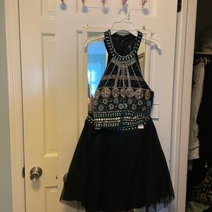 Beautiful formal short skirt and top set. Never worn.